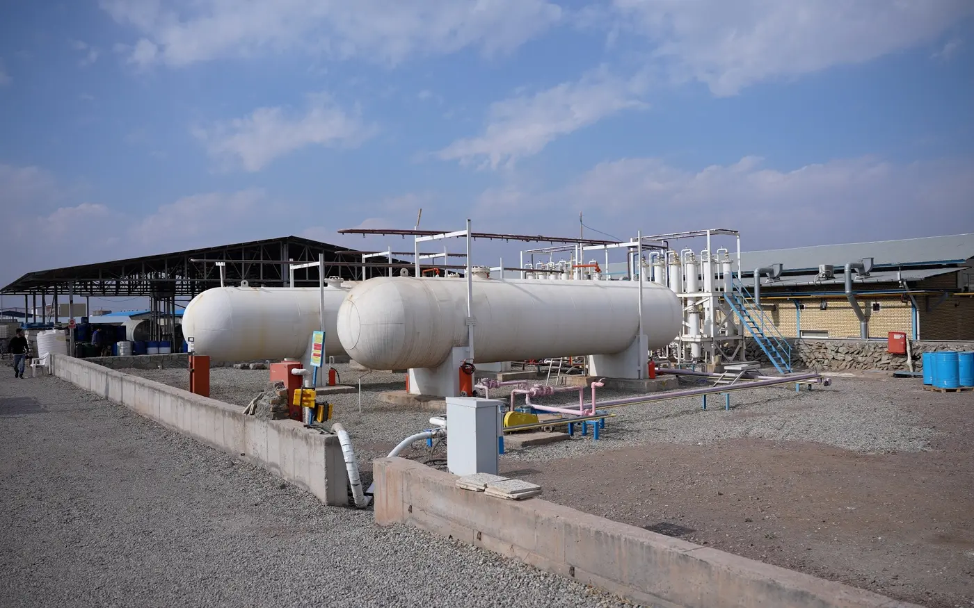 Industrial storage and process tanks at an aerosol manufacturing facility